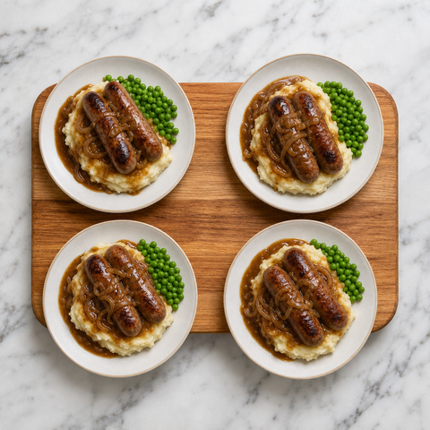 Salsicce e purè con salsa di cipolle