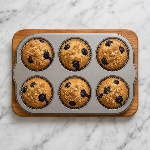 Goldbraune Heidelbeermuffins mit Haferbelag