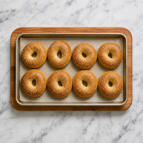 Freshly baked golden Montreal-style sesame bagels