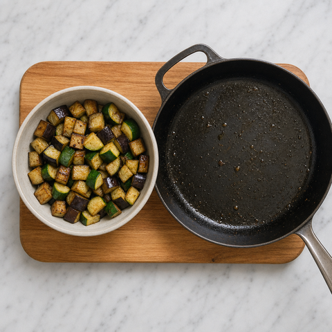 Eggplant and zucchini browned separately before being added to ratatouille