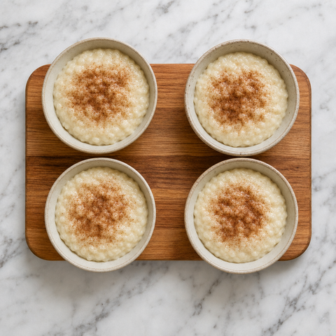Bowls of creamy rice pudding finished with cinnamon sugar