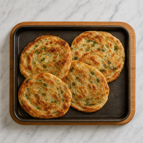 Golden, flaky scallion pancakes with crisp blistered edges