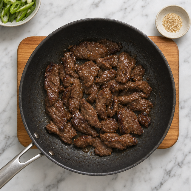 Glossy caramelized bulgogi beef cooked through in the skillet.